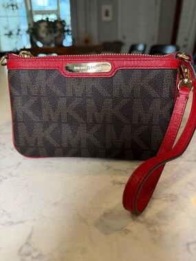 Michael Kors Brown MK Signature Wristlet with Red Trim